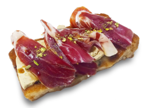 Tosta en pan de torrija con jamón, foie de pato y compota de manzana